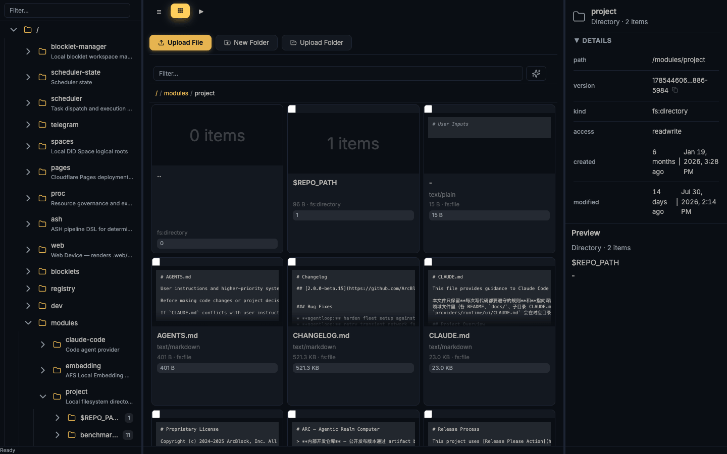 Grid view of a writable directory: content thumbnails on cards, and the Upload File / New Folder / Upload Folder toolbar